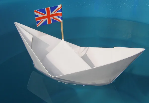 stock image Paper ship with UK Flag