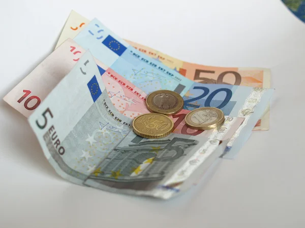Nota e moeda em euros — Fotografia de Stock