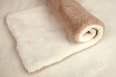 Roll of fur material clipart