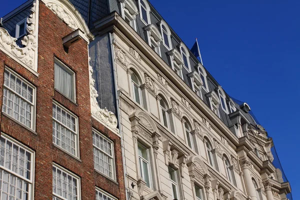 Typical Amsterdam houses over blue sky — Stock Photo, Image