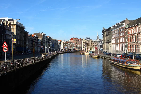 Typical Amsterdam houses over blue sky — Stock Photo, Image
