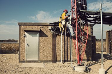 Tower climber starting way up clipart