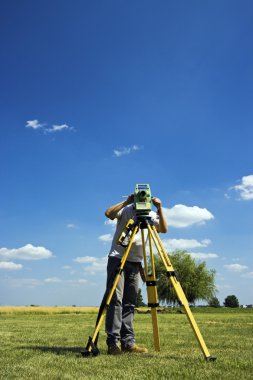 Behind Theodolite clipart