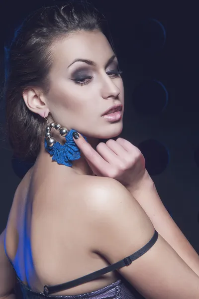 Beautiful sexy woman in earrings — Stock Photo, Image