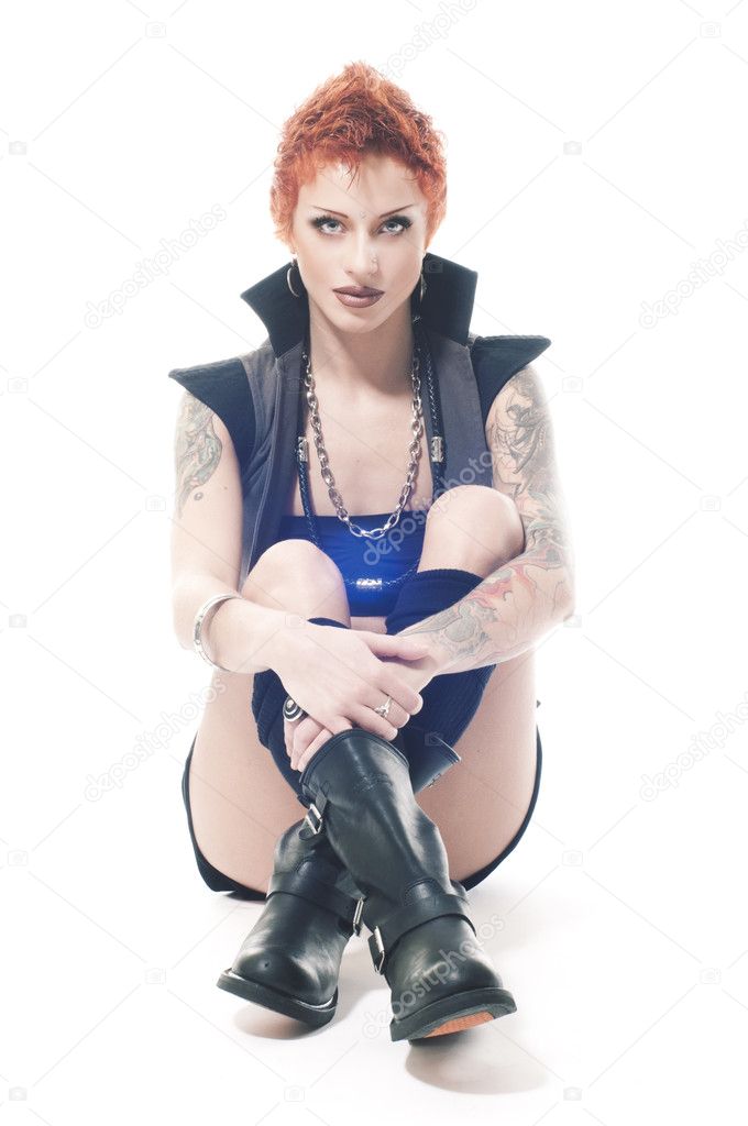 Sexy rocky woman with red hair