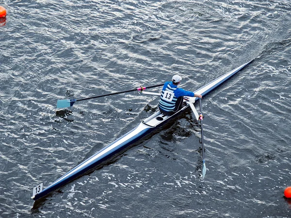 stock image Man rowing in boat on water