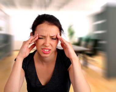 Woman heaving a headache clipart