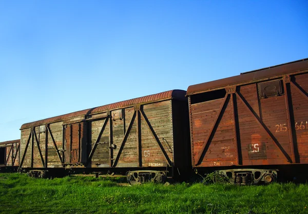 Carritos viejos oxidados del tren de mercancías — Foto de Stock