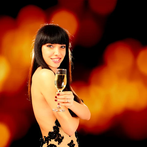 Sexy vrouw met champagne glas — Stockfoto