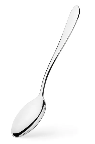 Silver spoon stands vertically — Stock Photo, Image