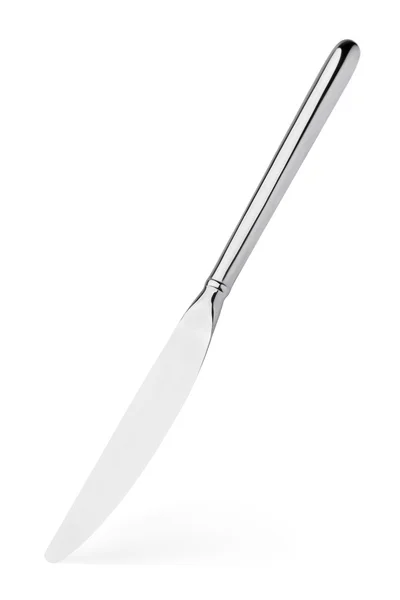 Srebrny nóż stoi pionowo na białym tle — Zdjęcie stockowe