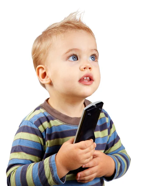 Babyjongen met afstandsbediening — Stockfoto
