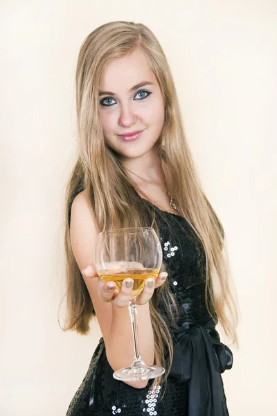 Young beautiful girl with a glass ptale wine — Stock Photo, Image