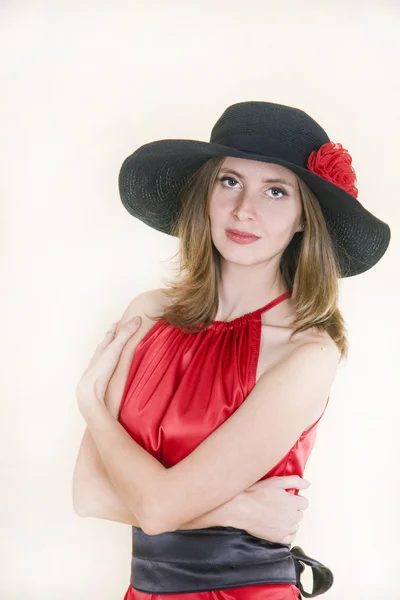 Η κυρία με κόκκινο φόρεμα και καπέλο — Φωτογραφία Αρχείου