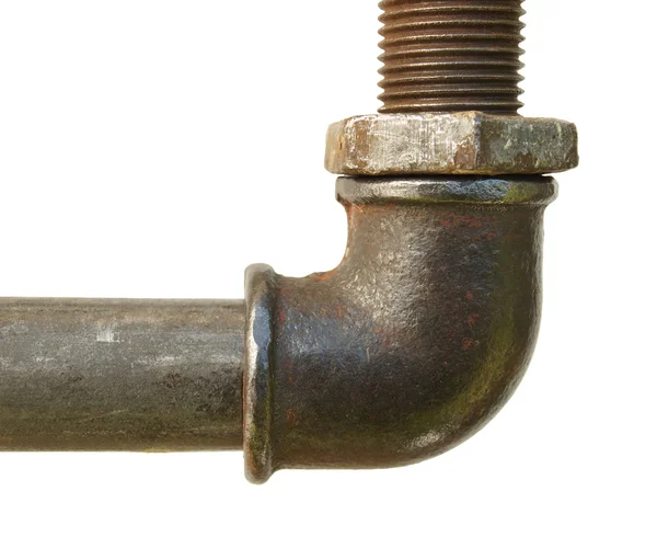 A fragment of the old water conduit consisting of pipes and fitt — Stock Photo, Image