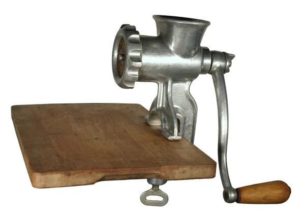 Classical meat grinder on a wooden cutting board. — Stock Photo, Image