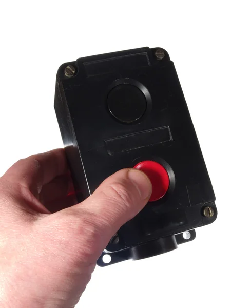 Палець на червоній кнопці, блок управління, ізольований на білому Ba — стокове фото