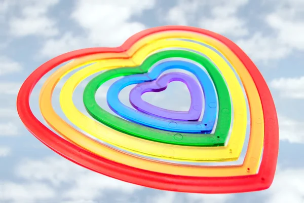Seis formas de coração voando entre nuvens — Fotografia de Stock