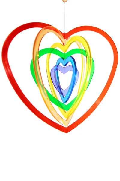 Zes multi gekleurde hart vormen opknoping — Stockfoto
