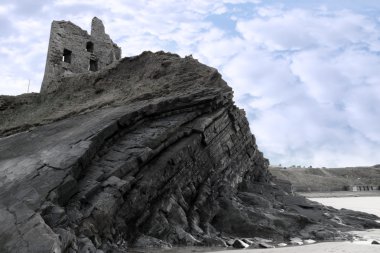 Old ruins of a castle on a high cliff clipart