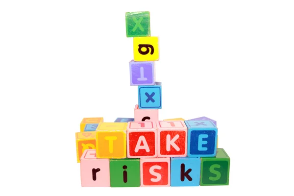 Correre rischi in blocchi di lettere di gioco — Foto Stock