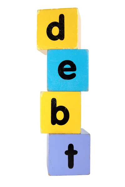 Dívida em brinquedo jogar letras de bloco com caminho de recorte — Fotografia de Stock