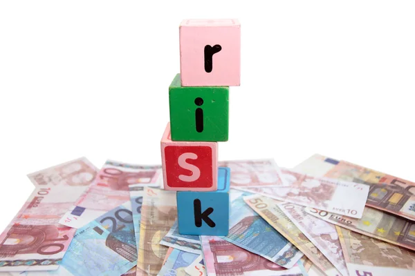 Money risk in toy play block letters — Stock Photo, Image