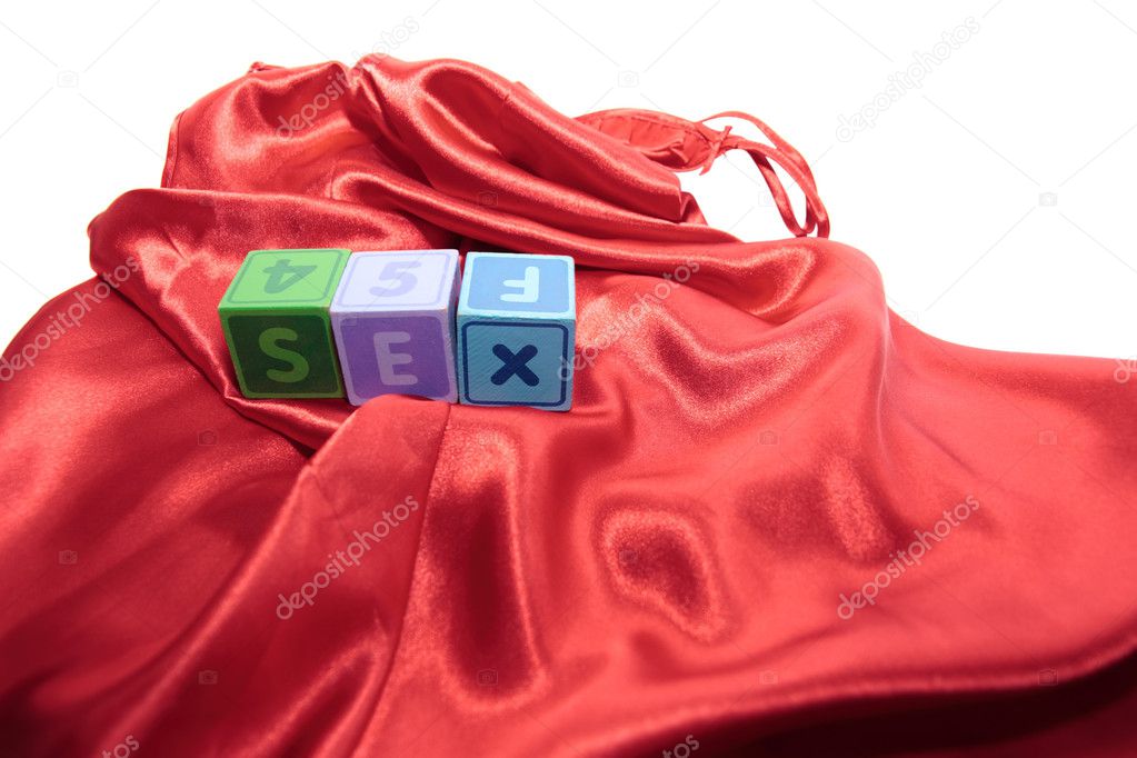 Sex on letter cubes on silk nightie