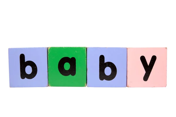 Bébé dans le jouet jouer lettres moulées avec chemin de coupe — Photo