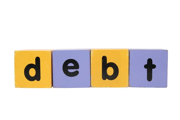 Debt in toy play block letters with clipping path on white — Stock Photo, Image