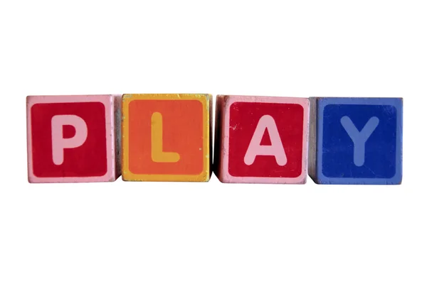 Play spelt in toy play block letters with clipping path — Stock Photo, Image