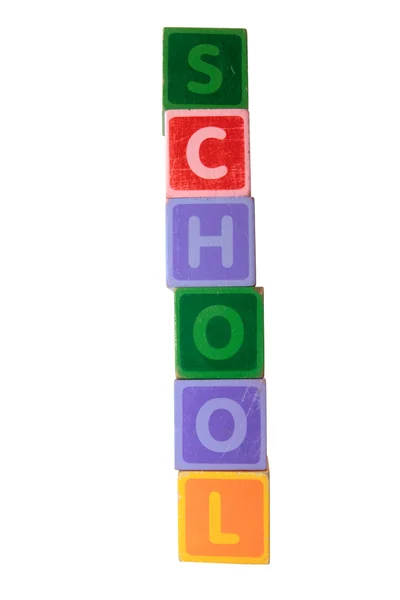 Schule in Spielzeug spielen Blockbuchstaben mit Clipping Pfad auf weiß — Stockfoto