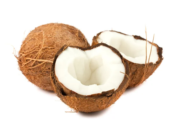 Pełny i dwie połówki kokosowe — Zdjęcie stockowe