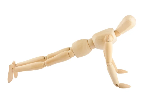 Wooden Mannequin in exercise — Stock Photo, Image