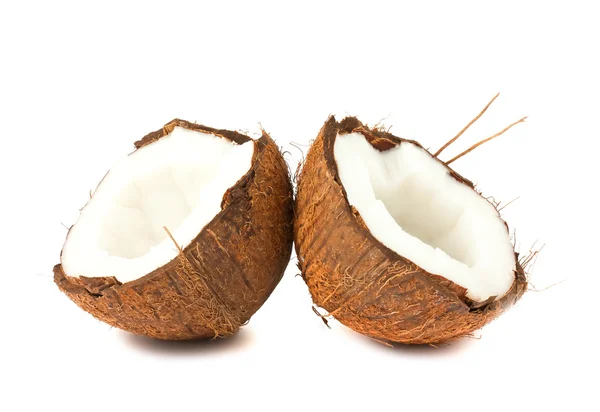 Dos mitades de coco sobre fondo blanco —  Fotos de Stock