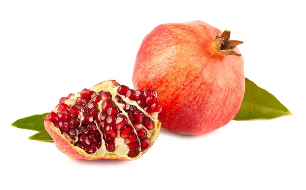 stock image Ripe pomegranate with leaves