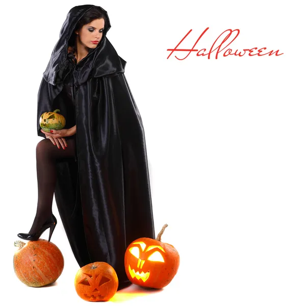 Sexuální bruneta v obleku čarodějnice v noci na halloween — Stock fotografie