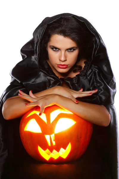 Morena sexual en traje de bruja en la noche de Halloween —  Fotos de Stock