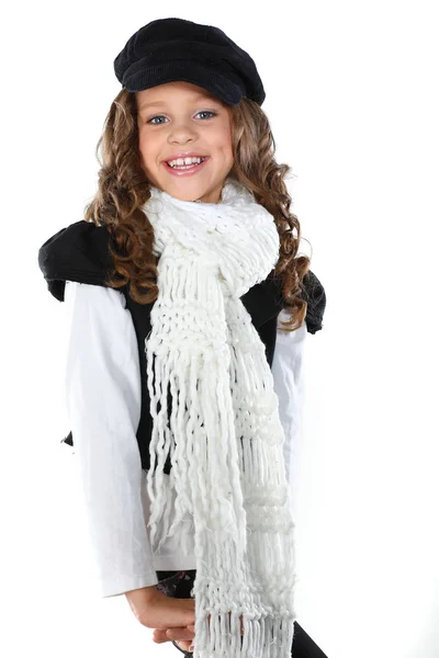 Une petite belle fille est en vêtements d'automne, isolée sur un fond blanc — Photo