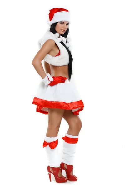 Schöne und sexy Frau trägt Weihnachtsmann Klausel Kostüm isoliert auf einem weißen b — Stockfoto