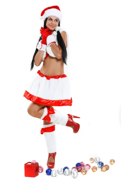 Bella e sexy donna che indossa costume clausola di Babbo Natale isolato su una b bianca — Foto Stock