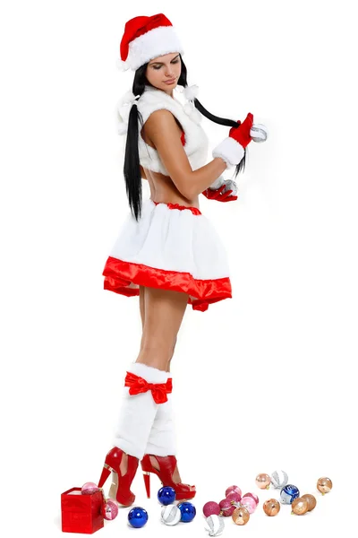 Bella e sexy donna che indossa costume clausola di Babbo Natale isolato su una b bianca — Foto Stock
