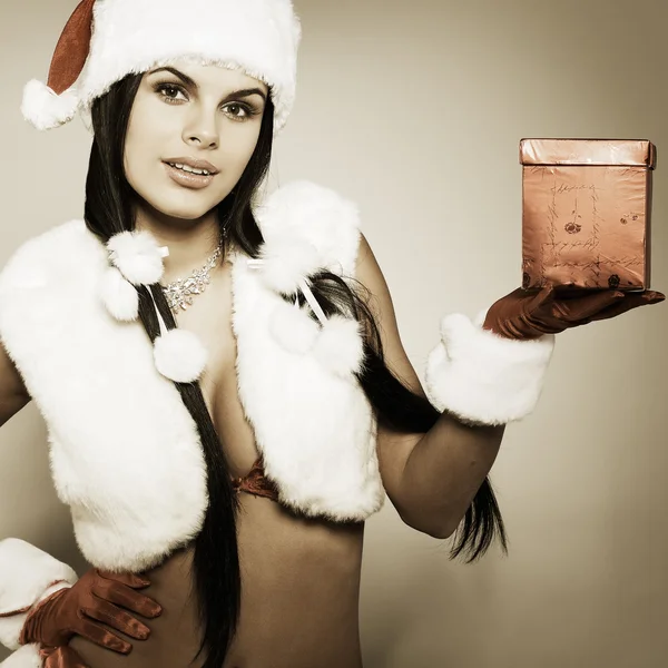 穿圣诞老人条服装的美丽和性感的女人 — 图库照片