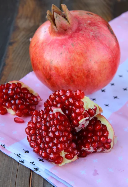 stock image Pomegranates, whole and cut open