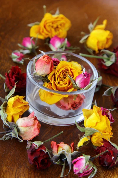 Dried rose hipson on a wooden table — Stock Photo, Image