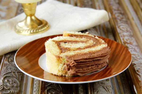 stock image Biscuit roulade with chocolate cream