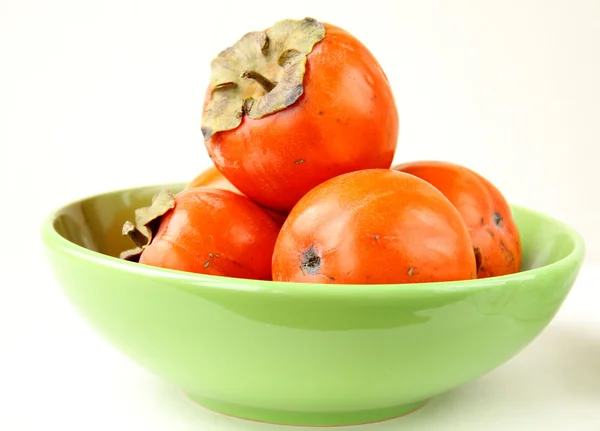 stock image Persimmon fruit on a white background