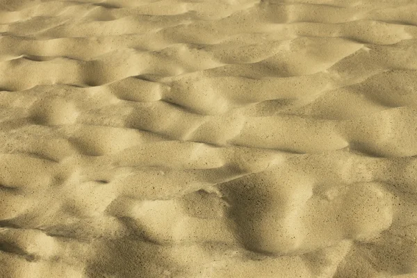 Vlnité žlutý písek — Stock fotografie