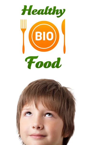 Cabeza joven mirando el signo de comida saludable —  Fotos de Stock