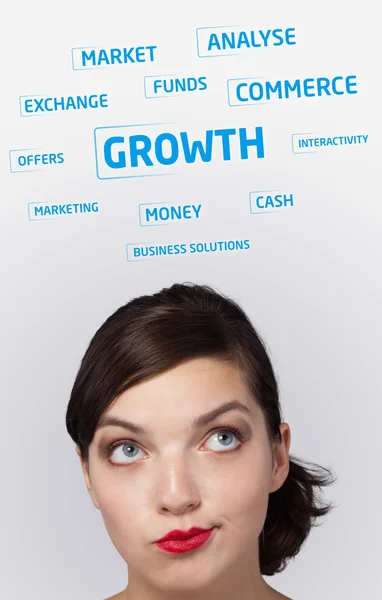 Молодая девушка голову глядя на бизнес-иконы и образы — стоковое фото